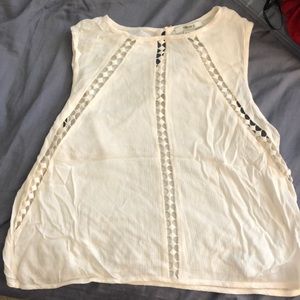 Sleeveless white shirt